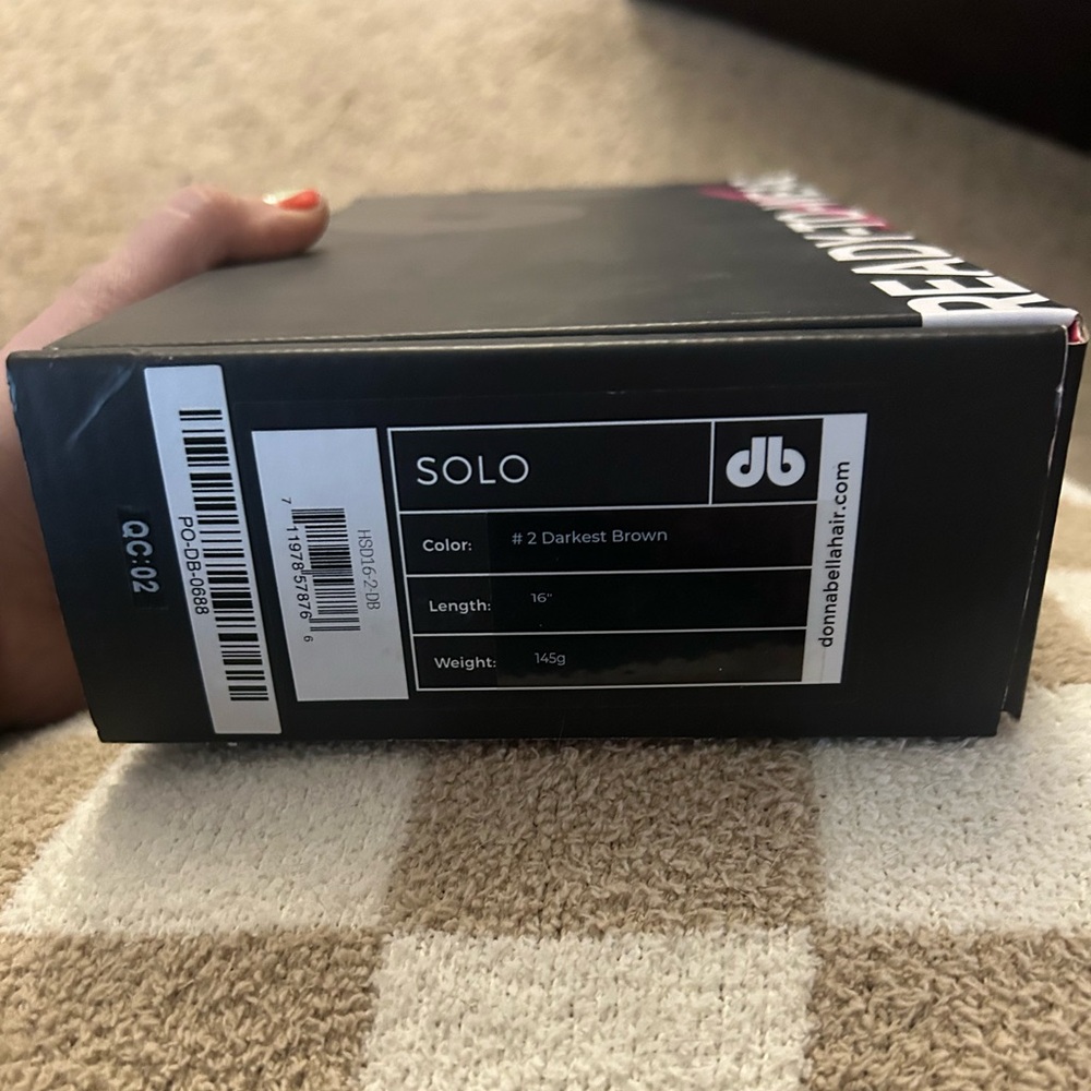 Brand new. Donna Bella 16”/ 145g darkest brown clip in HALO hair extensions.